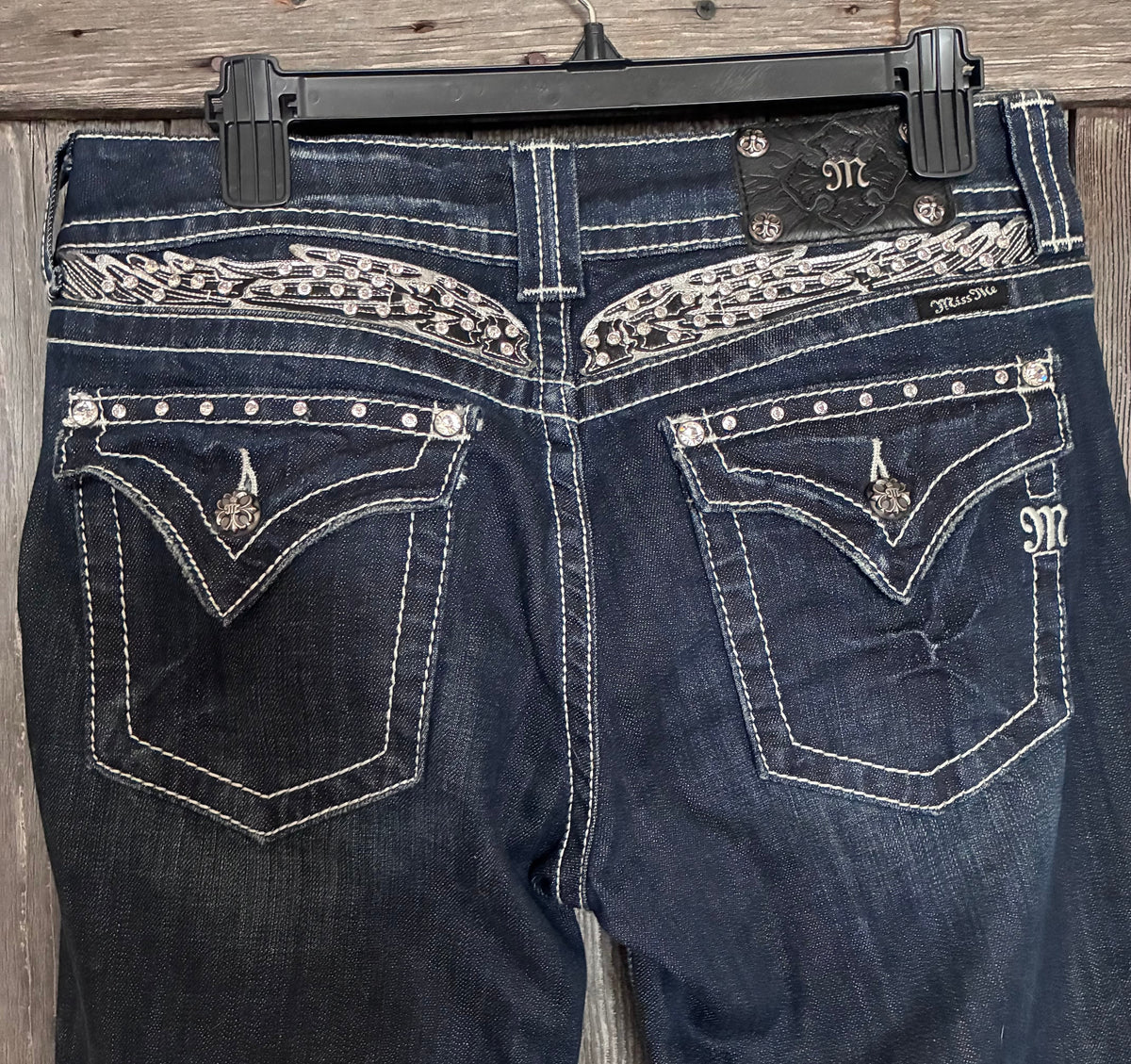 Miss Me Jeans angel wing rhinestone back pocket detail