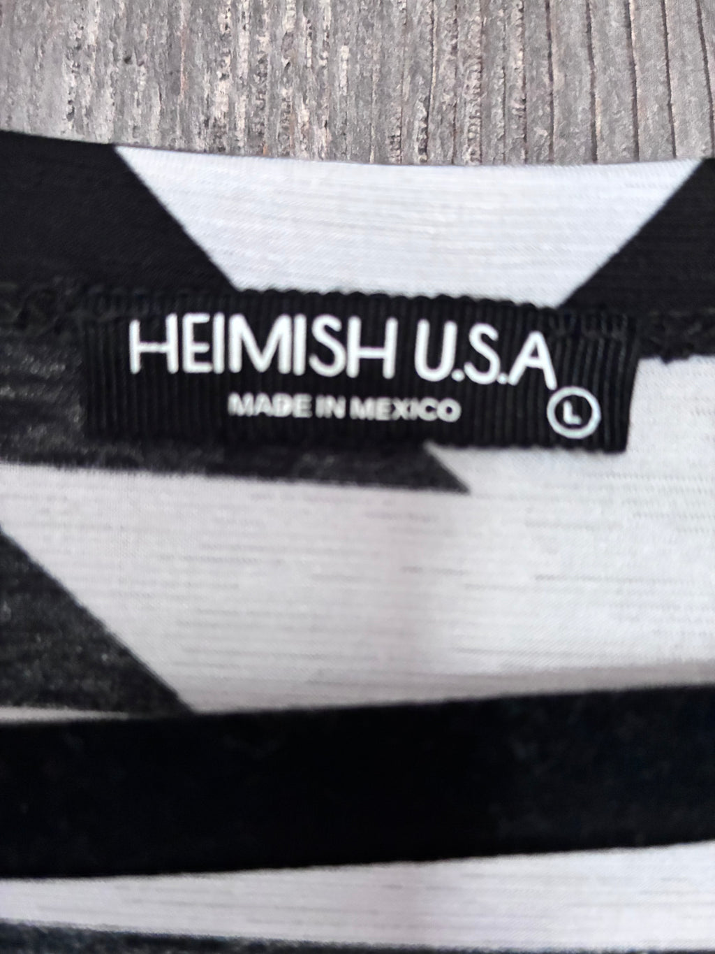 Heimish USA Black & White Aztec Peplum Top