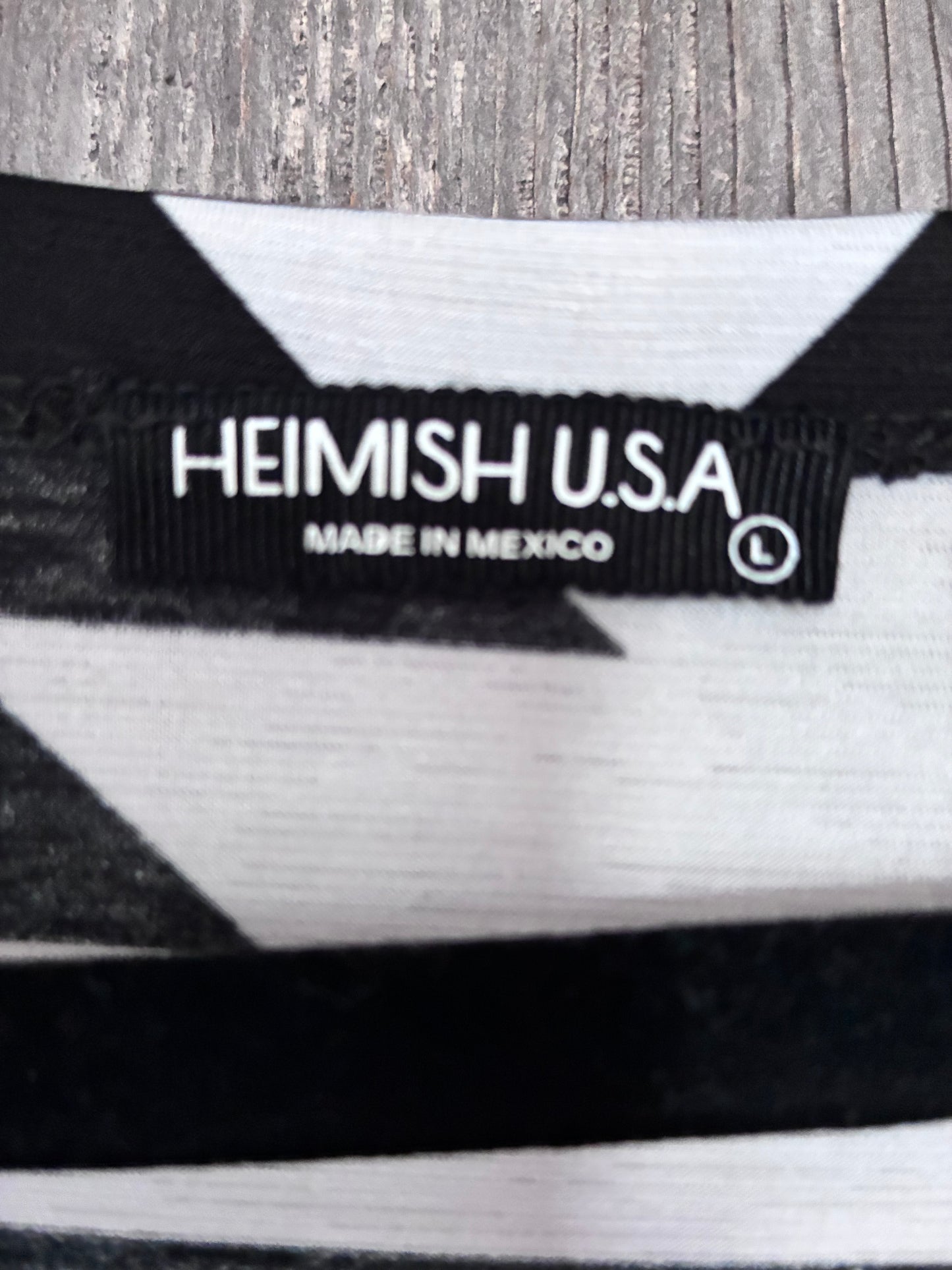 Heimish USA Black & White Aztec Peplum Top